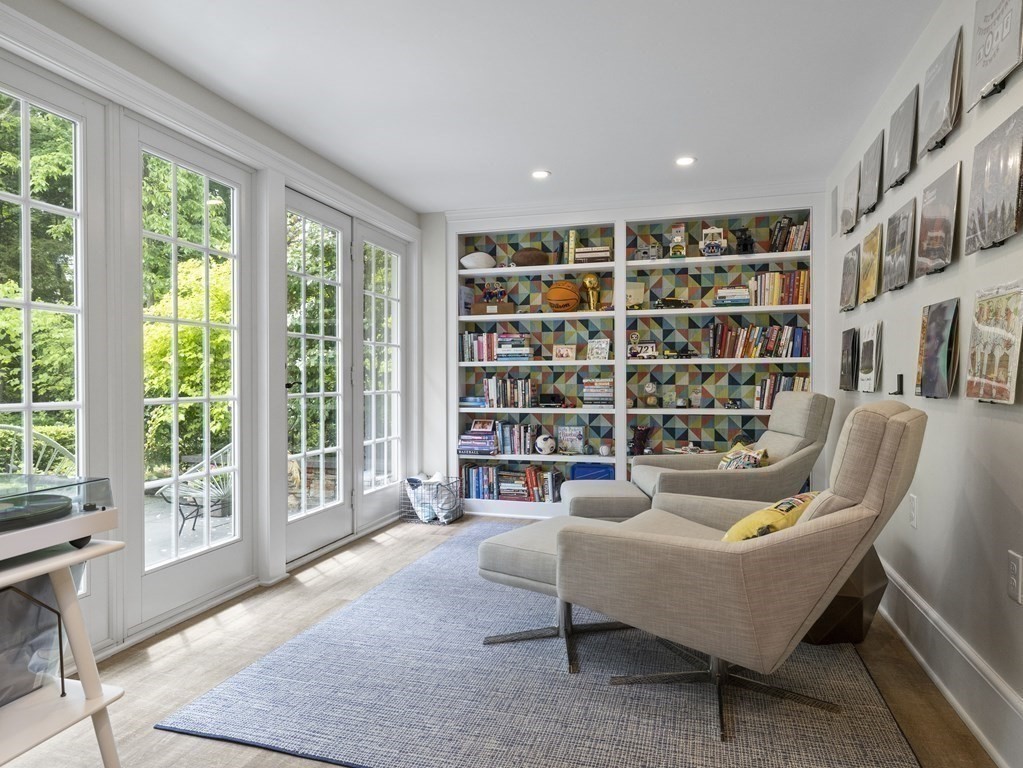 60 Damien Road Wellesley, MA 02481 - Photo 24 of 36 a living room with furniture and a book shelf