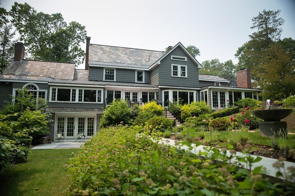 60 Damien Road Wellesley, MA 02481 - Photo 32 of 36 a front view of house with yard and trees around