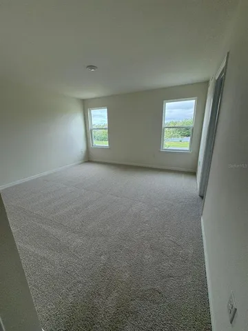 a view of a room with a window