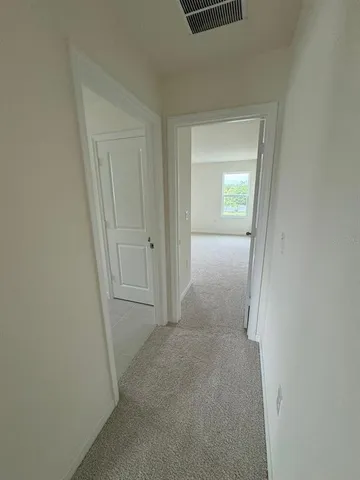 a view of hallway with sink