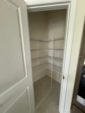 a bathroom with a glass door shower