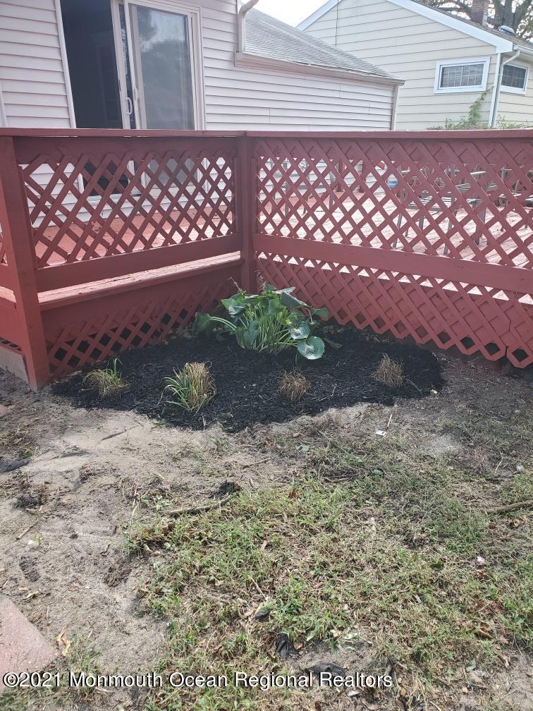 3 Midpark Drive Brick, NJ 08724 - Photo 3 of 12 a view of a wooden fence
