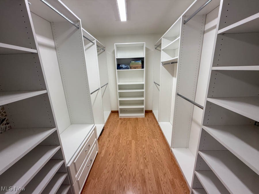15990 Old State Road Middlefield, OH 44062 - Photo 9 of 24 Spacious closet with light wood finished floors