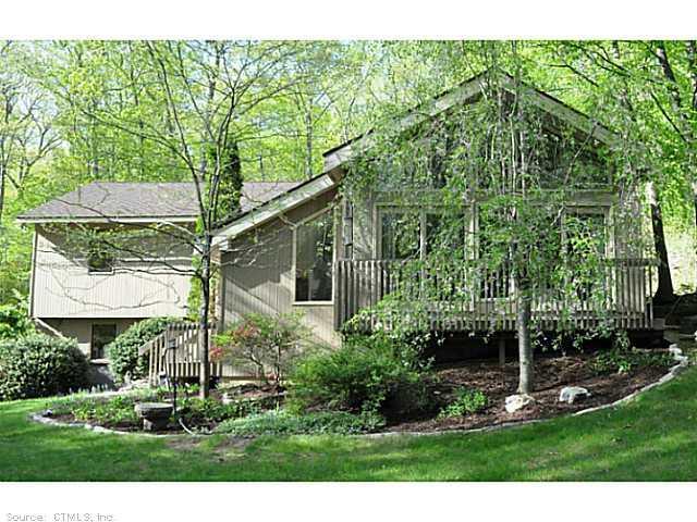 575 Peter Road Southbury, CT 06488 - Photo 1 of 1 a front view of a house with a yard