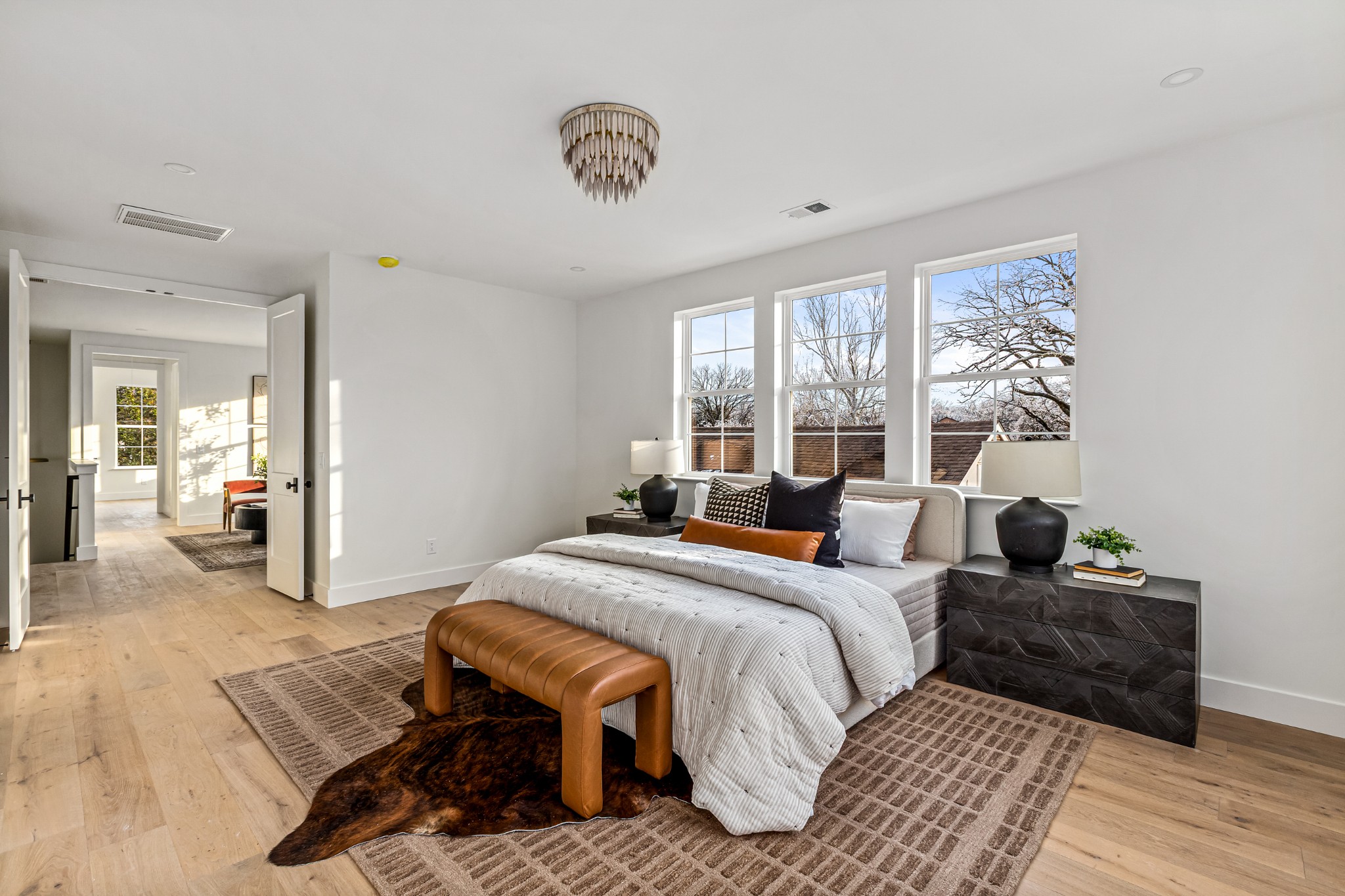 3819 Cross Creek Road Nashville, TN 37215 - Photo 14 of 36 a bedroom with a bed and wooden floor