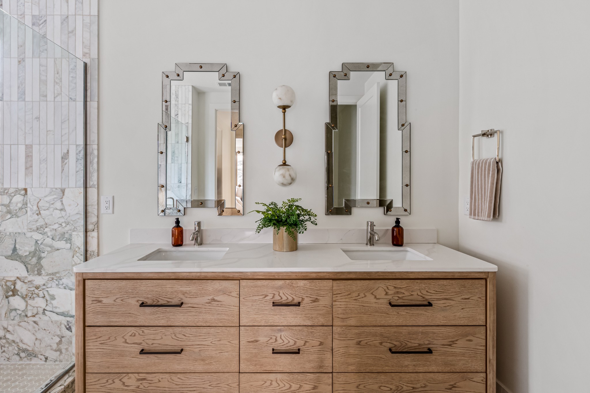 3819 Cross Creek Road Nashville, TN 37215 - Photo 18 of 36 a bathroom with a sink and a mirror