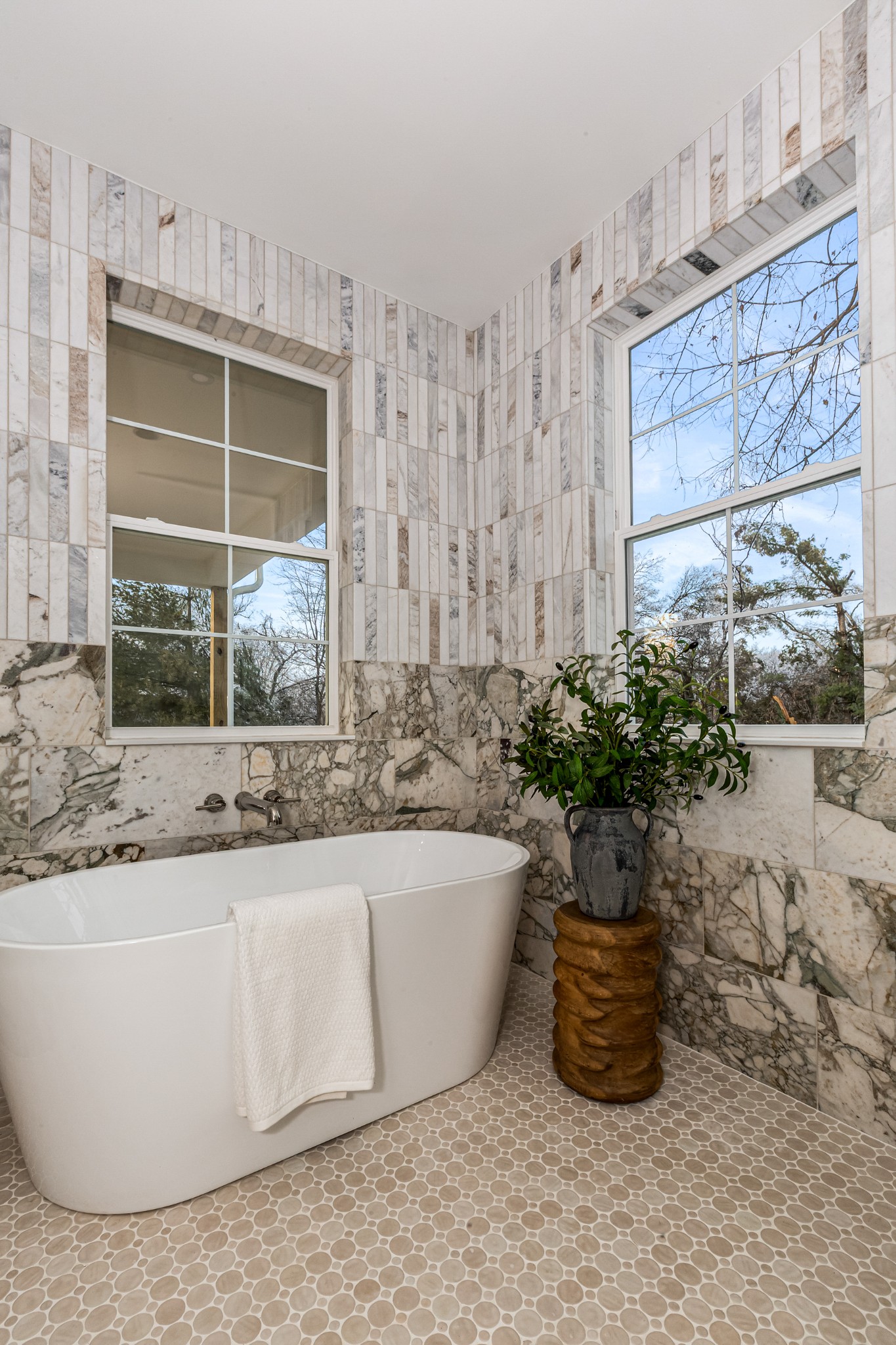 3819 Cross Creek Road Nashville, TN 37215 - Photo 19 of 36 a white bath tub sitting in a bathroom next to a window