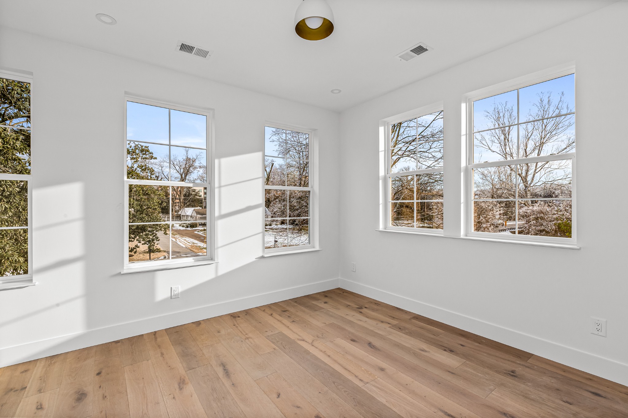 3819 Cross Creek Road Nashville, TN 37215 - Photo 23 of 36 a view of an empty room with wooden floor and a window