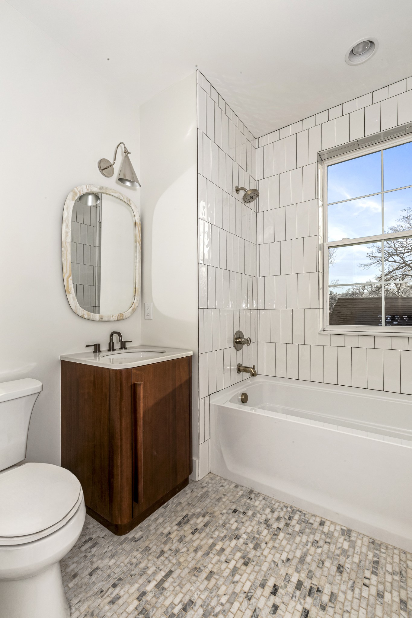 3819 Cross Creek Road Nashville, TN 37215 - Photo 24 of 36 a bathroom with a sink a toilet and bathtub