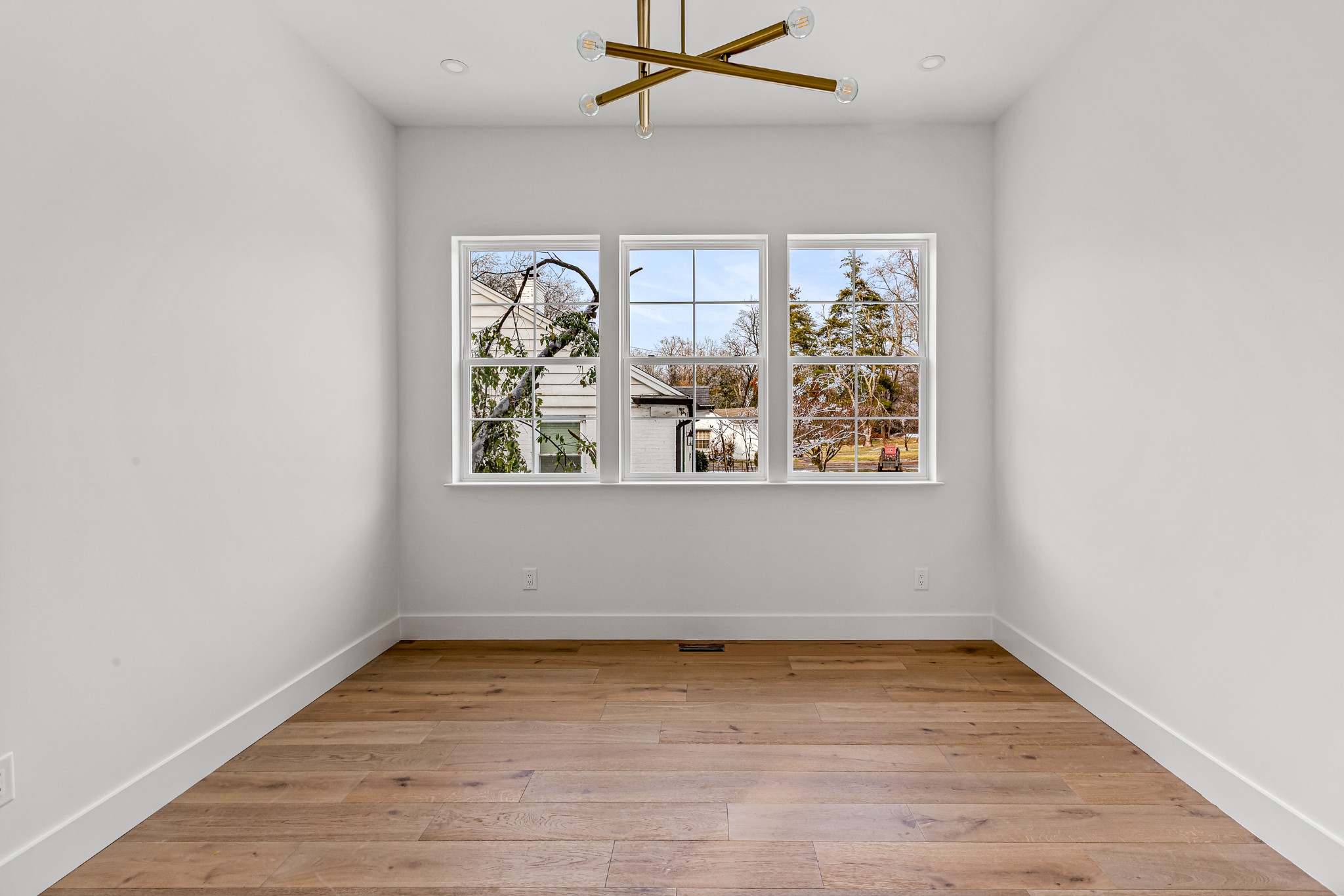 3819 Cross Creek Road Nashville, TN 37215 - Photo 29 of 36 an empty room with wooden floor and window