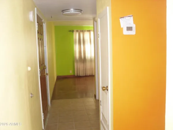 a view of a bathroom with a glass door