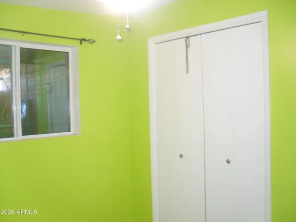 a view of a bathroom with a shower curtain