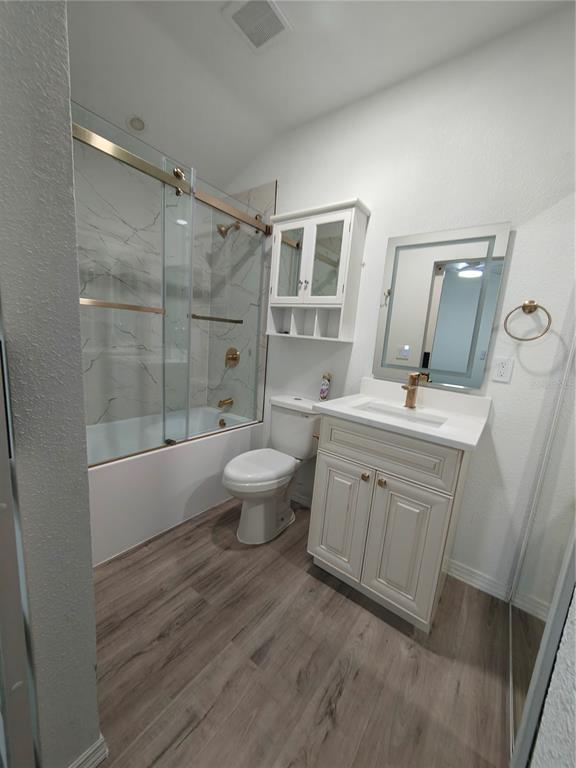 820 North Wekiwa Springs Road Apopka, FL 32712 - Photo 17 of 51 a bathroom with a sink toilet a mirror and shower