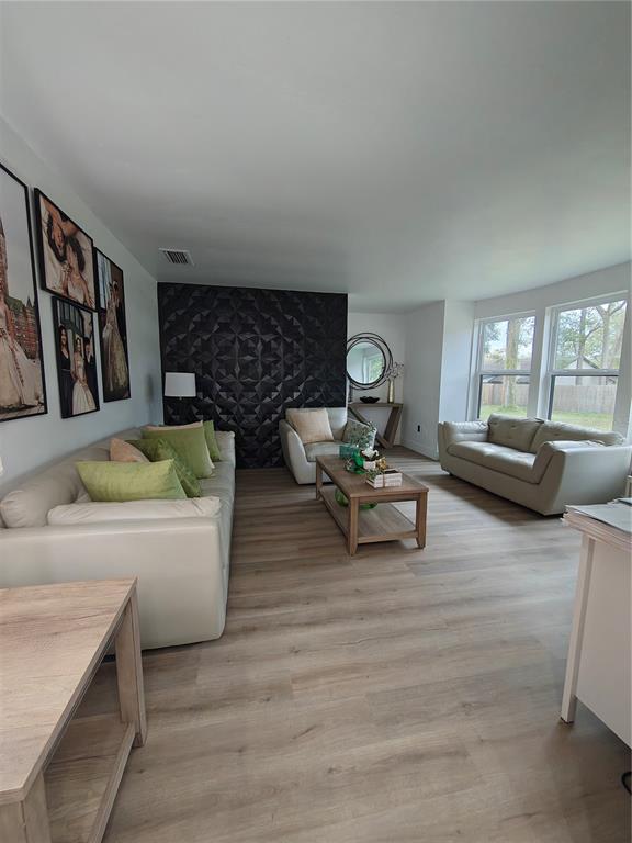 820 North Wekiwa Springs Road Apopka, FL 32712 - Photo 37 of 51 a living room with furniture and a couch