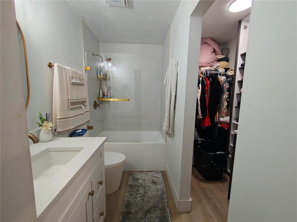 820 North Wekiwa Springs Road Apopka, FL 32712 - Photo 38 of 51 a bathroom with a sink and a mirror