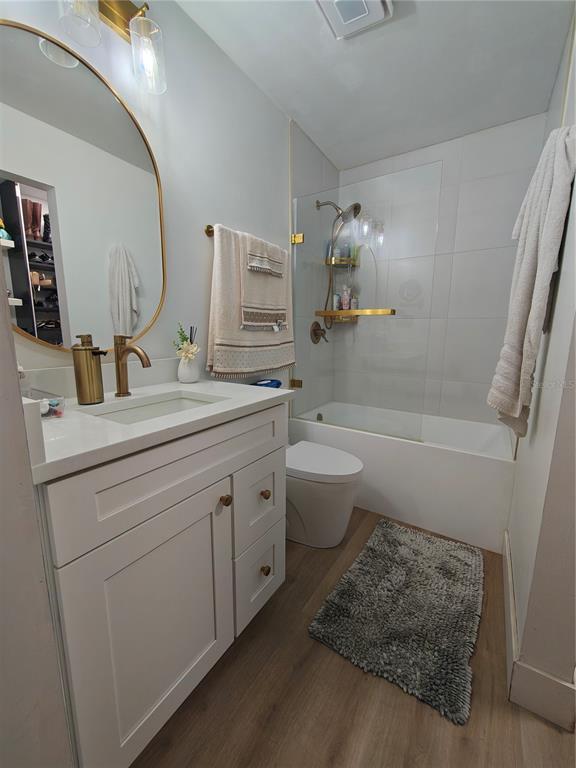 820 North Wekiwa Springs Road Apopka, FL 32712 - Photo 39 of 51 a bathroom with a tub sink and mirror