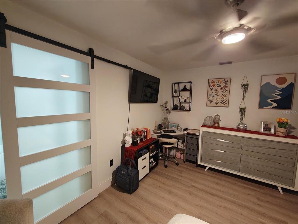 820 North Wekiwa Springs Road Apopka, FL 32712 - Photo 41 of 51 a living room with furniture and a flat screen tv