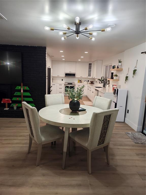 820 North Wekiwa Springs Road Apopka, FL 32712 - Photo 49 of 51 a view of a dining room with furniture