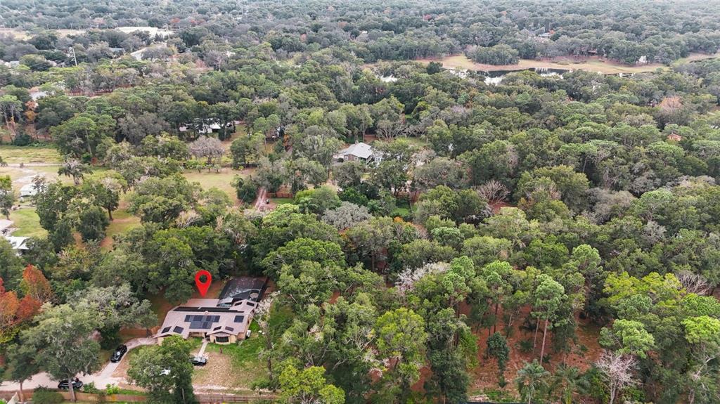 820 North Wekiwa Springs Road Apopka, FL 32712 - Photo 7 of 51 an aerial view of residential houses with outdoor space and trees