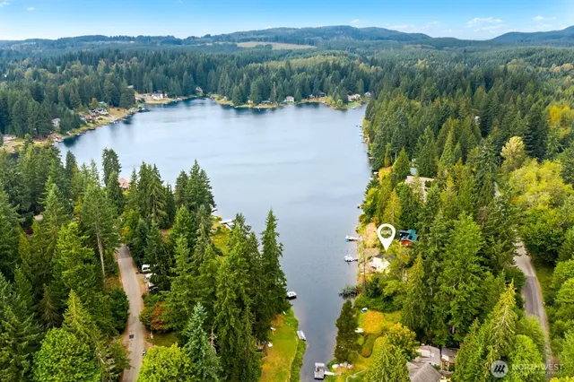a view of lake with green space