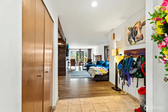a view of a livingroom with furniture and toys