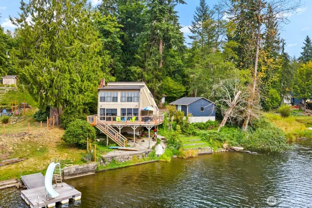 a view of a house with a ocean view