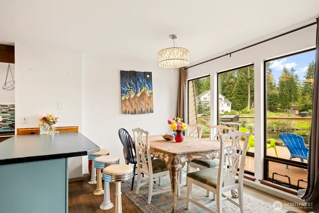 a view of a dining room with furniture window and outside view