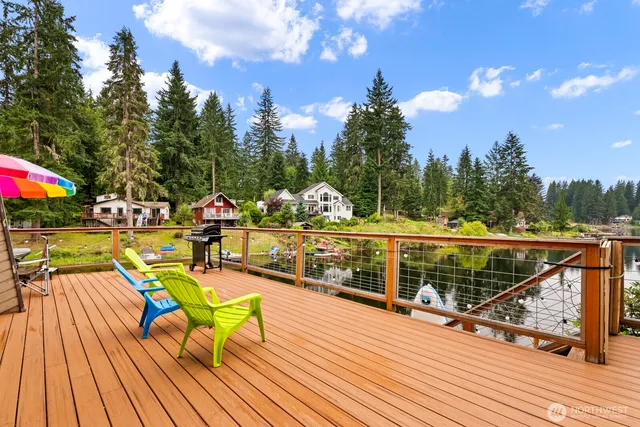 a view of swimming pool with sitting area