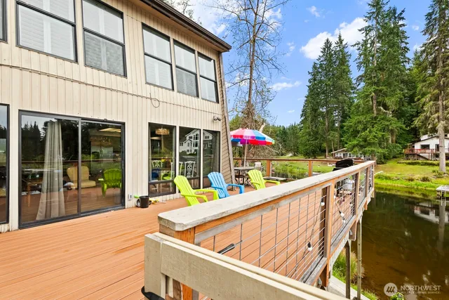 a view of an chairs and tables in the balcony