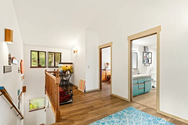 a view of a livingroom with furniture and a window