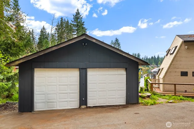a front view of a house with a garage