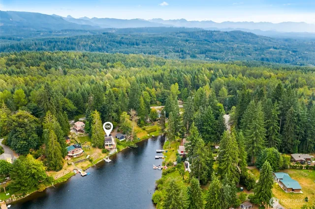 a view of a town with mountains in the background