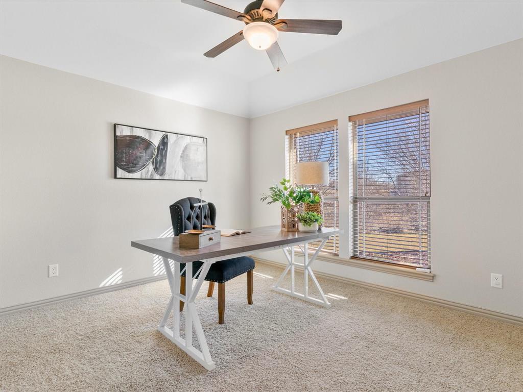 1311 Roe Helm Drive Rhome, TX 76078 - Photo 16 of 35 Private home office, just of of primary bedroom with lots of natural light