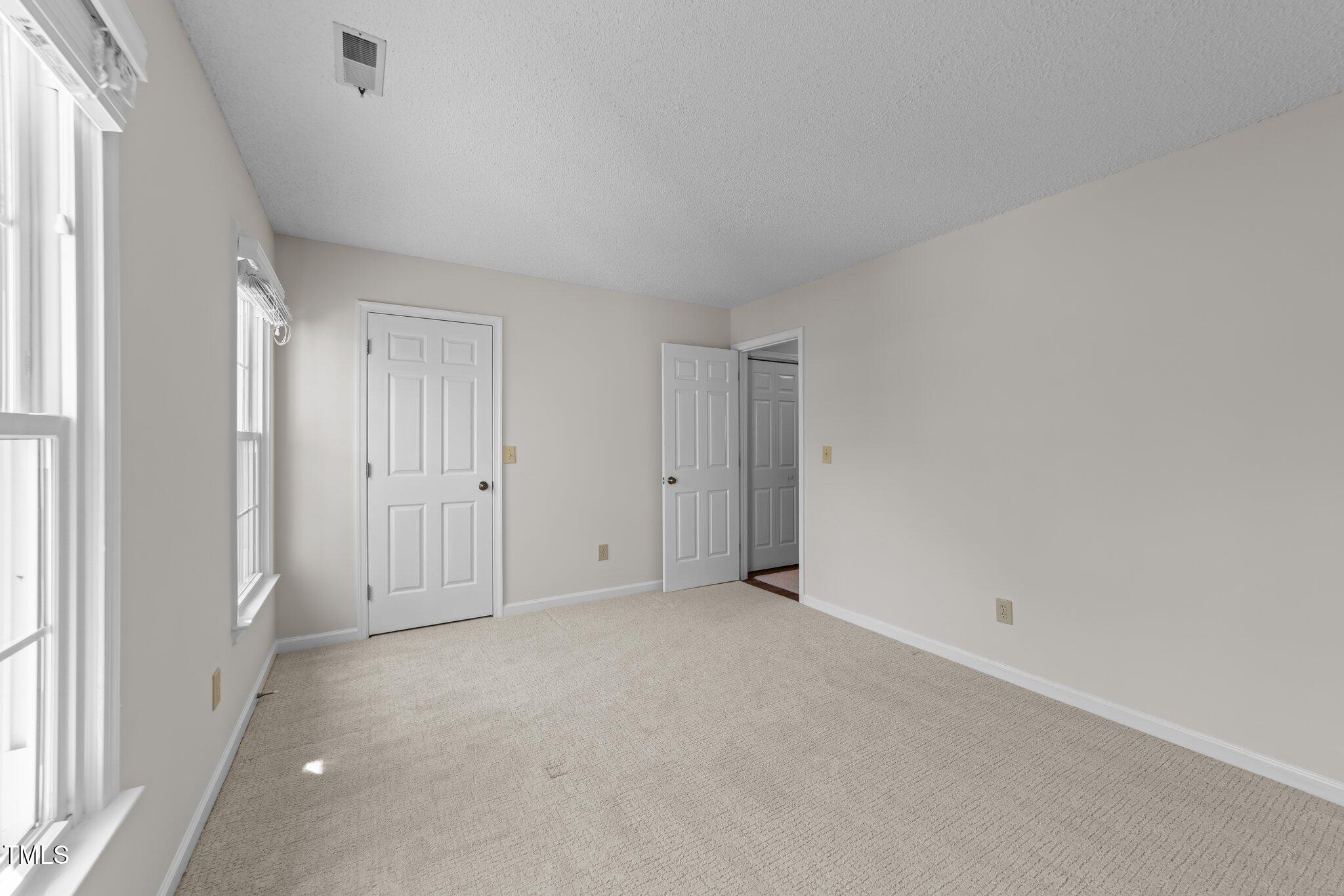 6817 Fairpoint Court Raleigh, NC 27613 - Photo 15 of 25 a view of an empty room