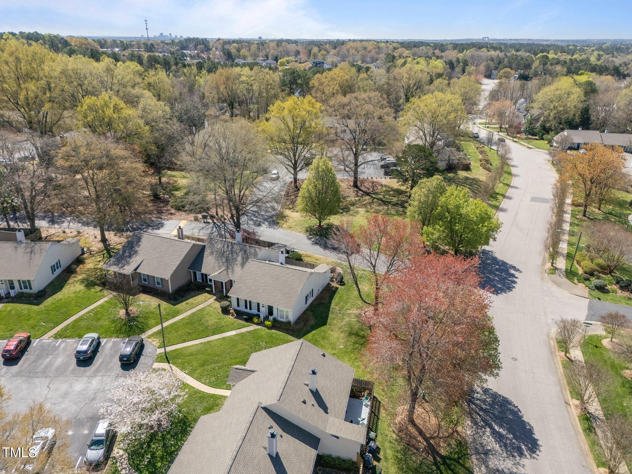 6817 Fairpoint Court Raleigh, NC 27613 - Photo 23 of 25 an aerial view of a house with a big yard