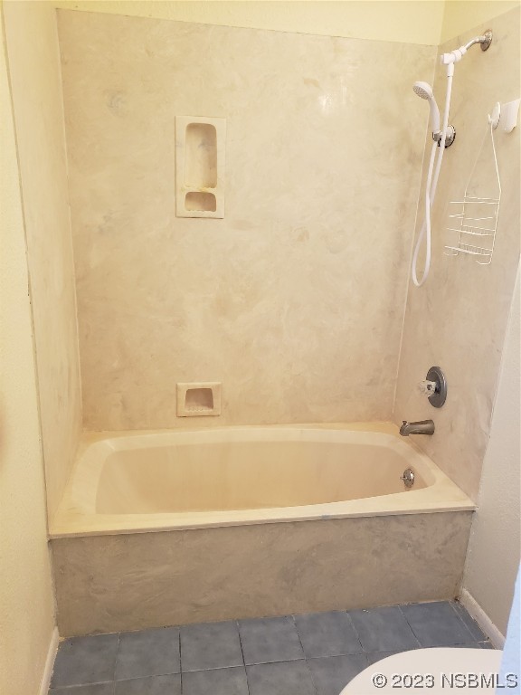 1867 Pine Tree Drive Edgewater, FL 32141 - Photo 7 of 21 a bathroom with a bathtub and shower