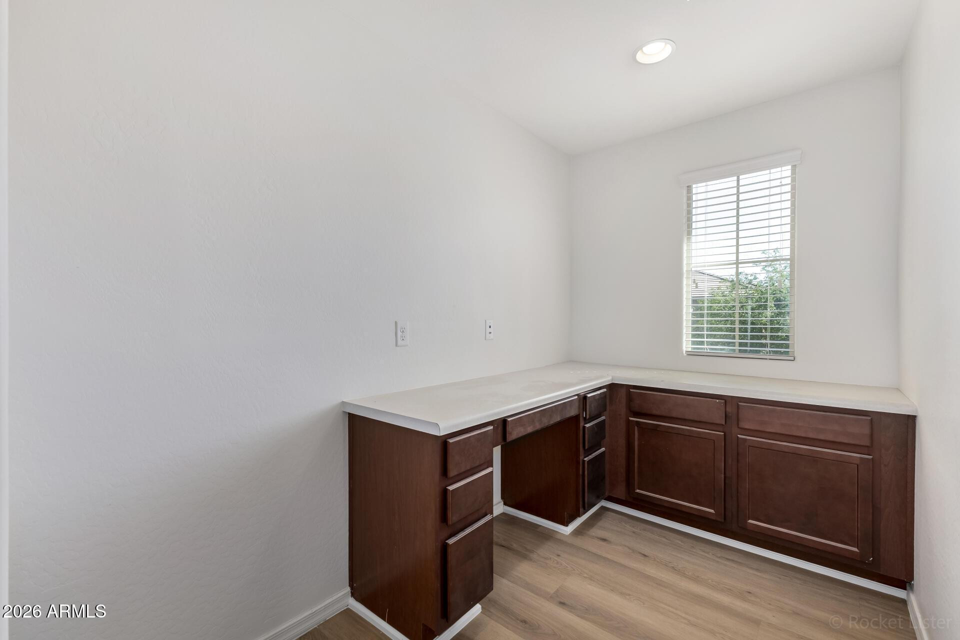 4084 East Ranch Road Gilbert, AZ 85296 - Photo 27 of 33 a kitchen with a sink cabinets and window