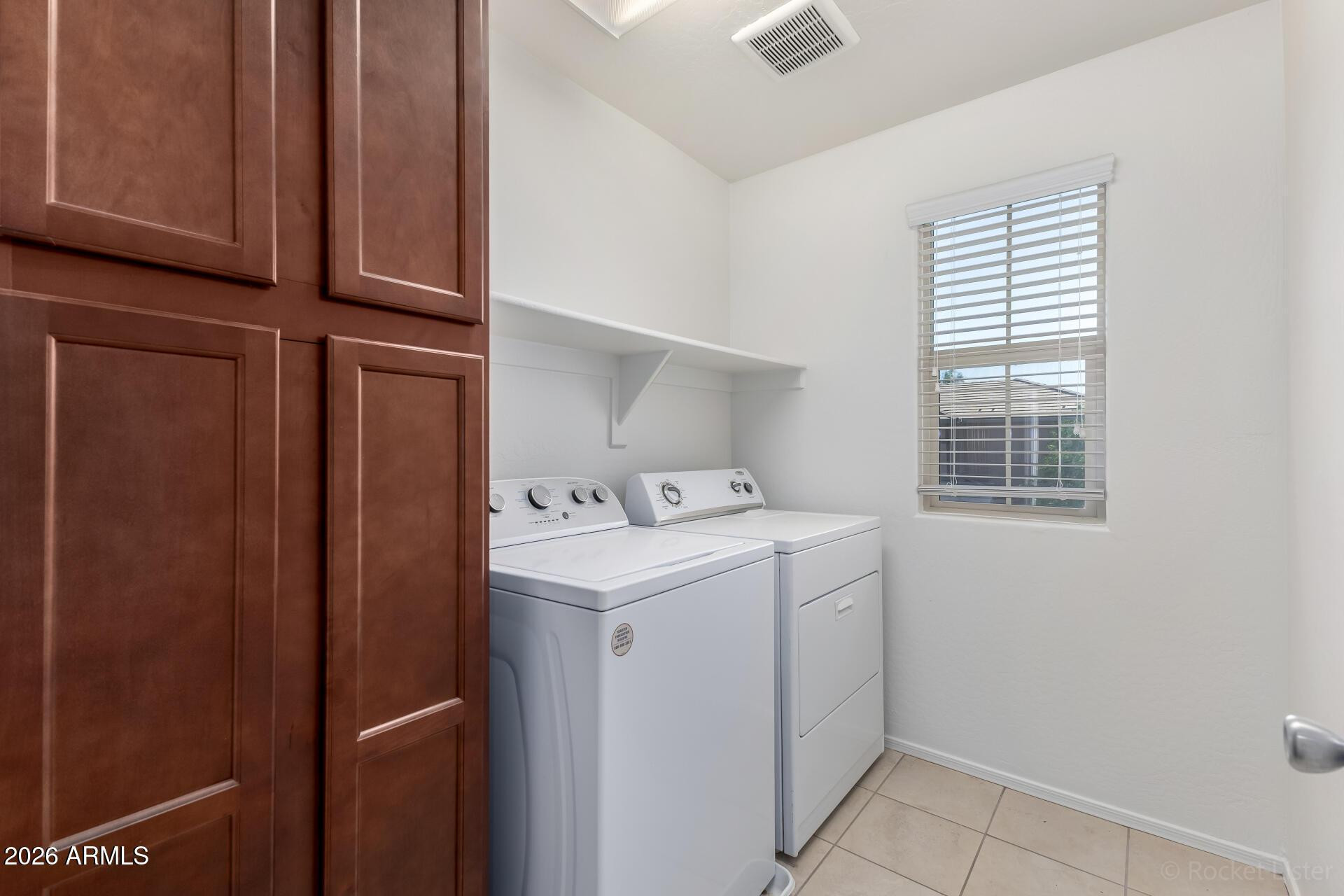4084 East Ranch Road Gilbert, AZ 85296 - Photo 28 of 33 a utility room with dryer and washer