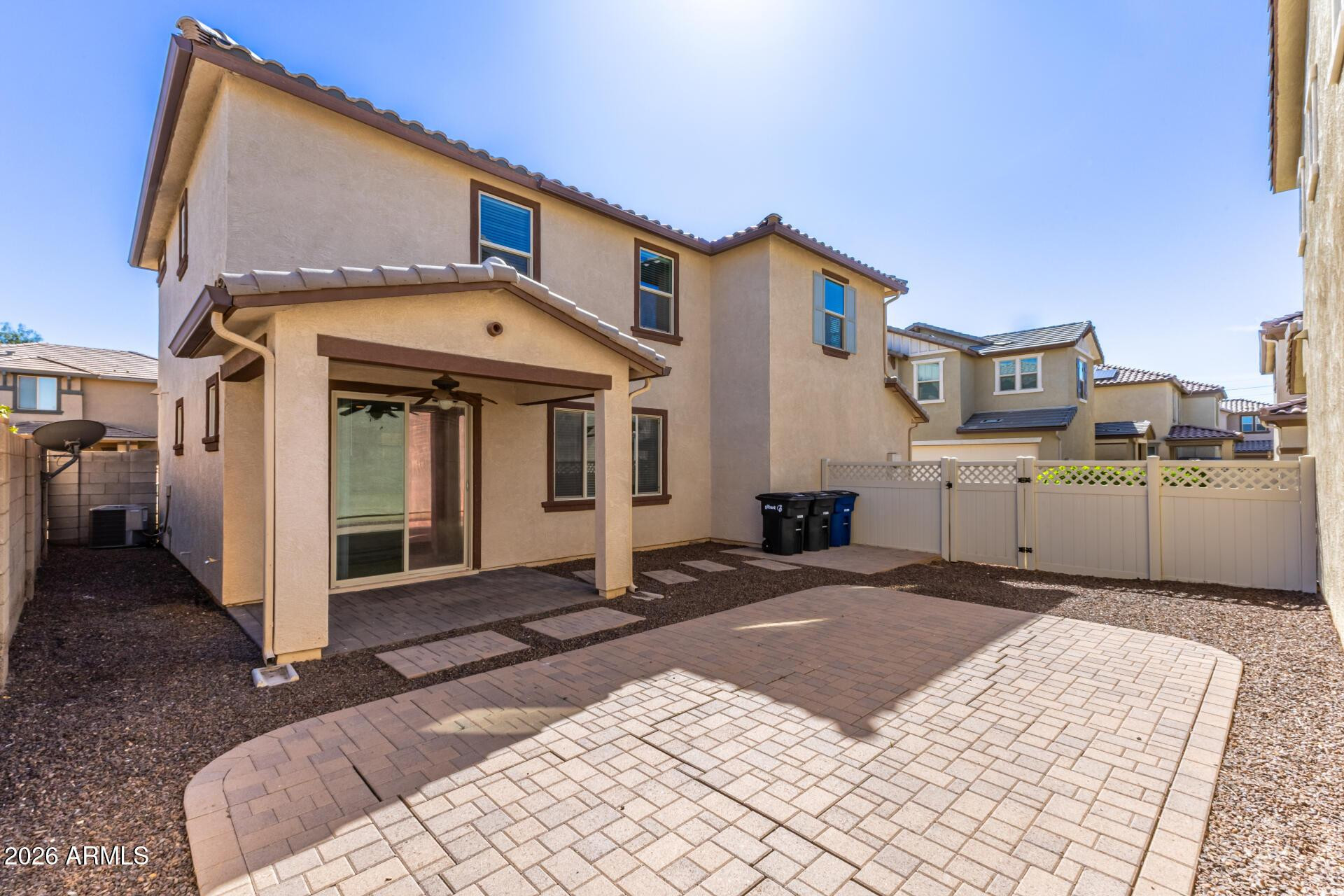 4084 East Ranch Road Gilbert, AZ 85296 - Photo 32 of 33 a view of a white house with a sink and a yard