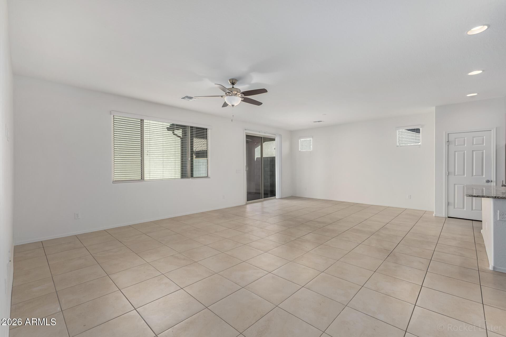 4084 East Ranch Road Gilbert, AZ 85296 - Photo 5 of 33 a view of an empty room with a window