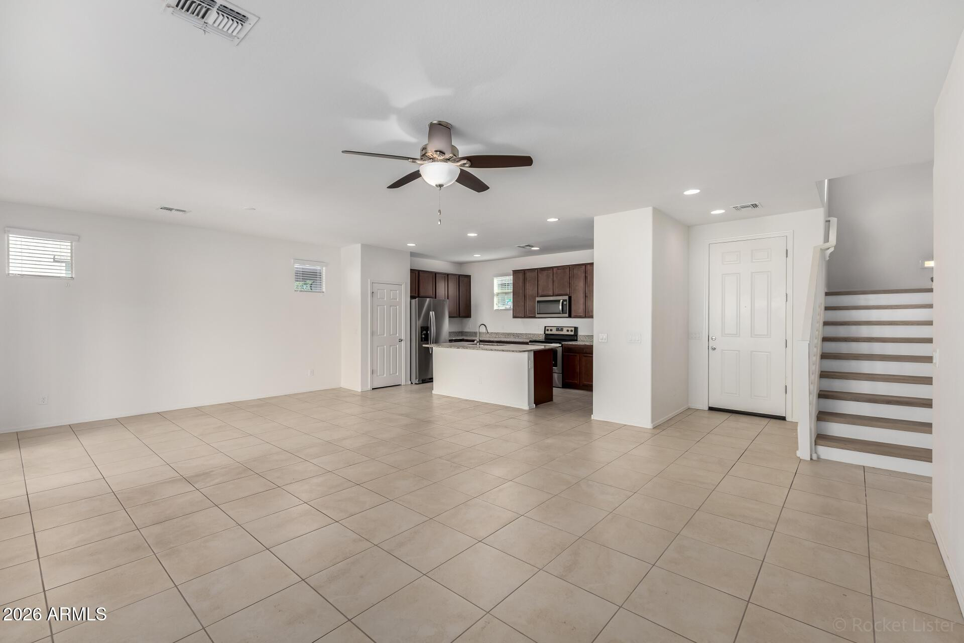 4084 East Ranch Road Gilbert, AZ 85296 - Photo 6 of 33 a view of kitchen with cabinets and refrigerator