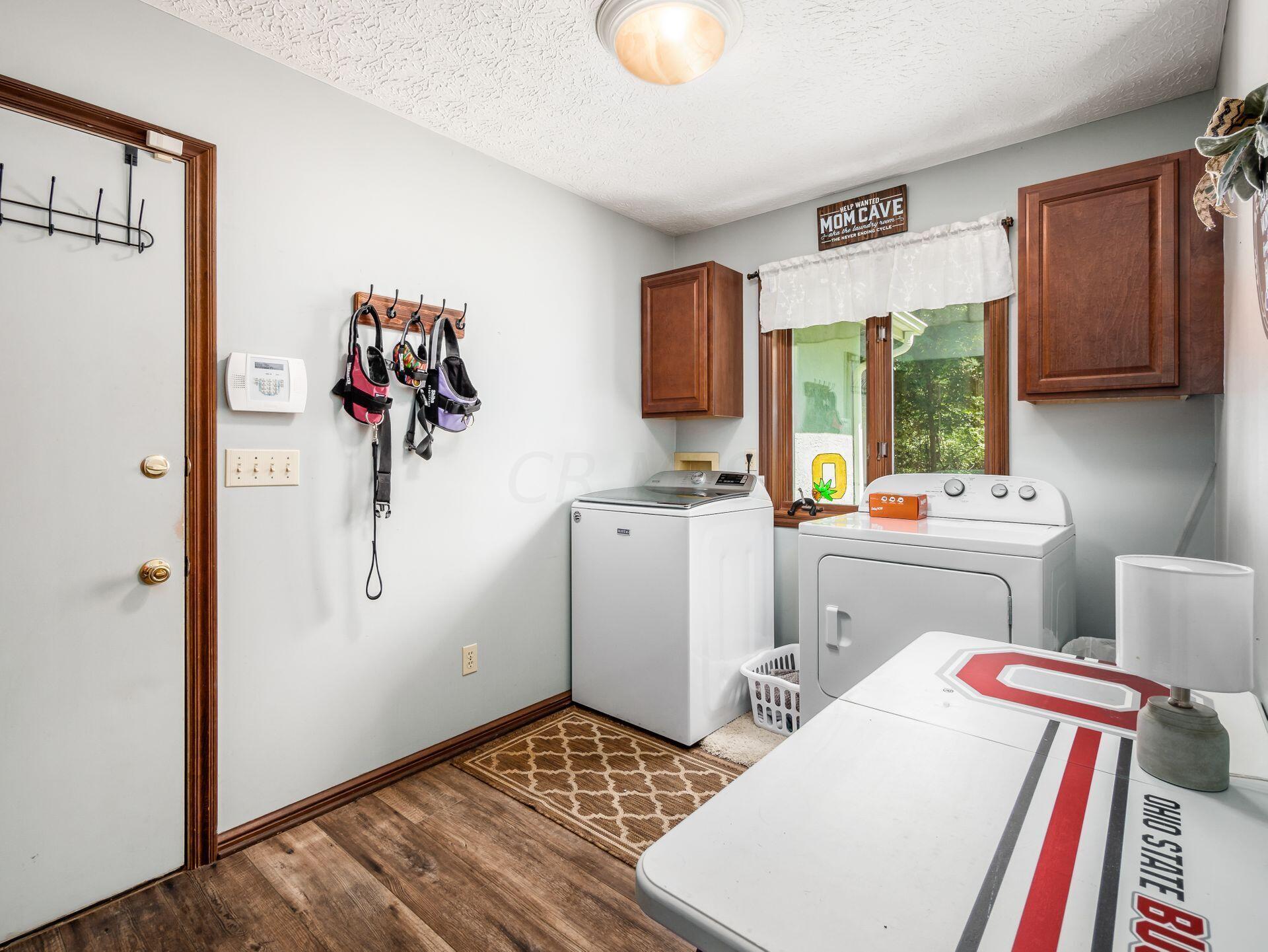 4150 Harlem Road Galena, OH 43021 - Photo 22 of 73 First Floor laundry room with plenty of room for a folding table.