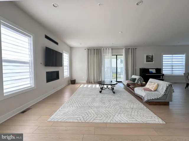 a kitchen with a sink a stove and a window