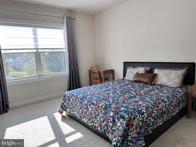 a view of a house with a back yard