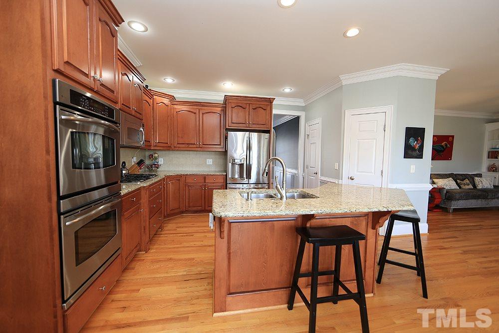 8215 Ortin Lane Raleigh, NC 27612 - Photo 11 of 29 Double oven and Stainless Steel Appliances!