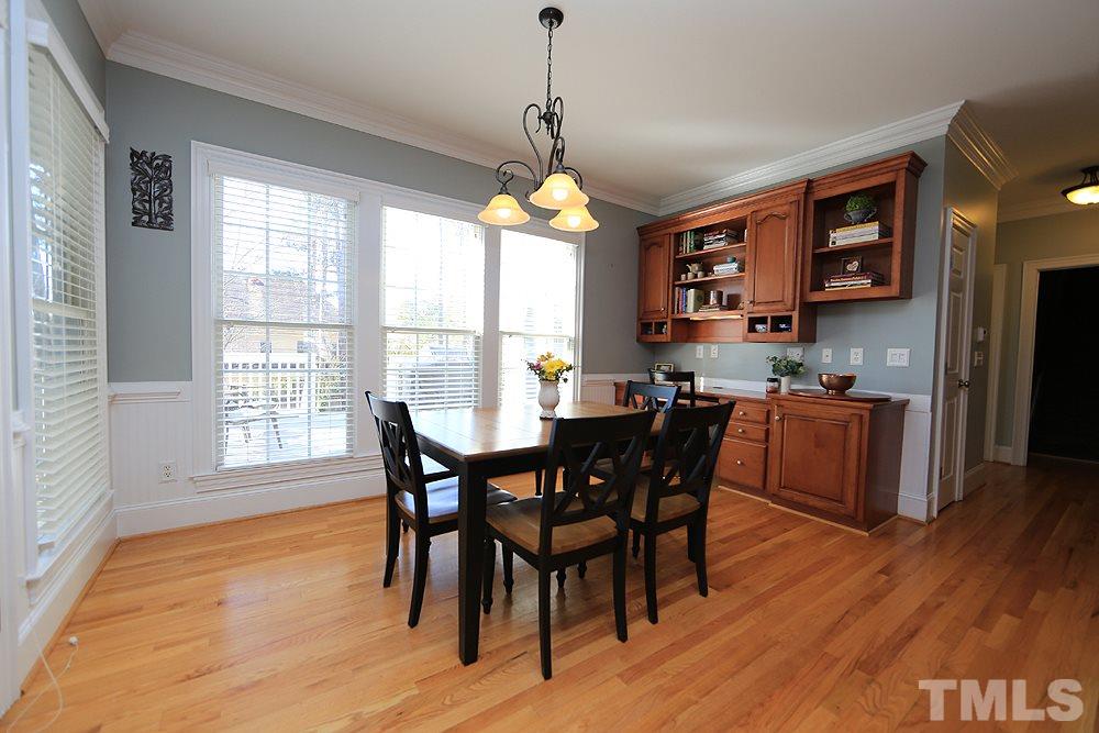 8215 Ortin Lane Raleigh, NC 27612 - Photo 14 of 29 Beautiful desktop with built-ins in eating area!