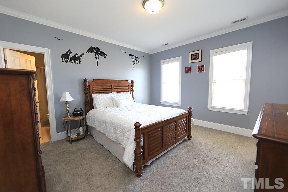 8215 Ortin Lane Raleigh, NC 27612 - Photo 22 of 29 Nice sized Bedroom with huge Walk-in Closet and a full Bath!