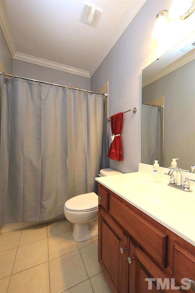 8215 Ortin Lane Raleigh, NC 27612 - Photo 23 of 29 Bathroom from Fourth Bedroom and into Hallway!