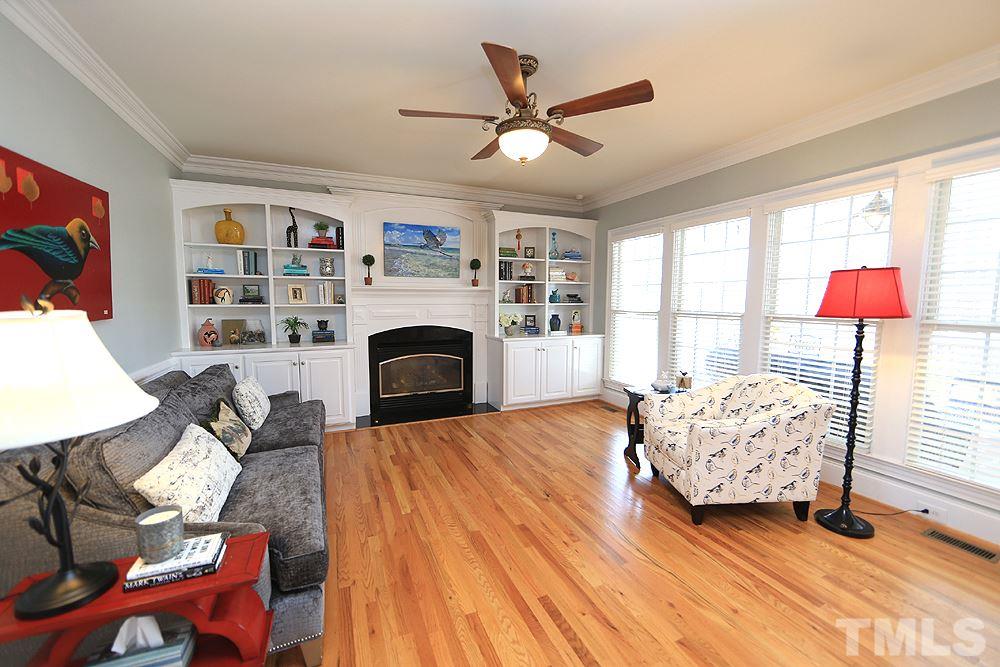 8215 Ortin Lane Raleigh, NC 27612 - Photo 7 of 29 Huge Family Room with beautiful built-ins!