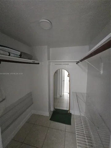 a view of a livingroom with furniture and a couch